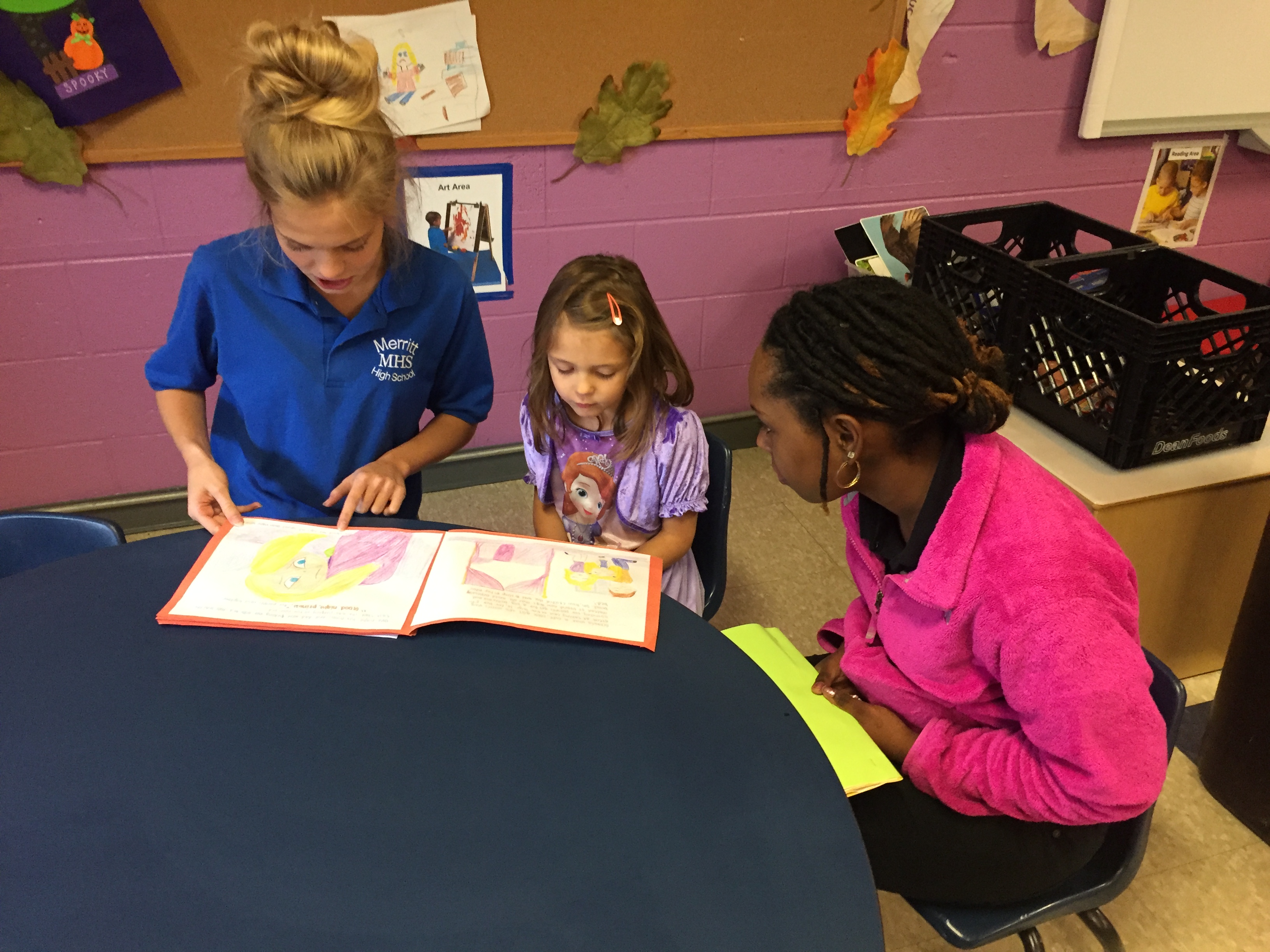 Merritt Academy high school educator teaching her students.