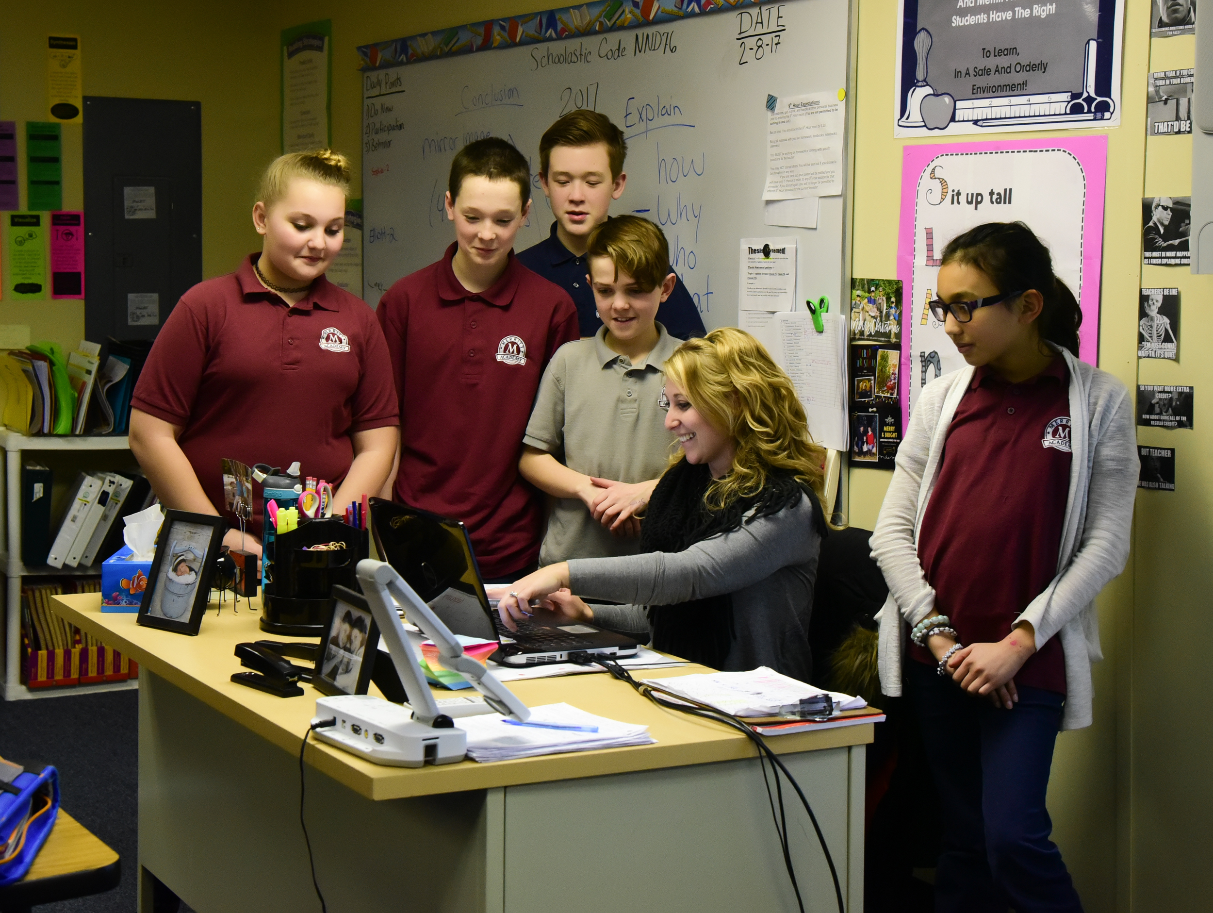 Merritt Academy middle school teacher in front of her class.