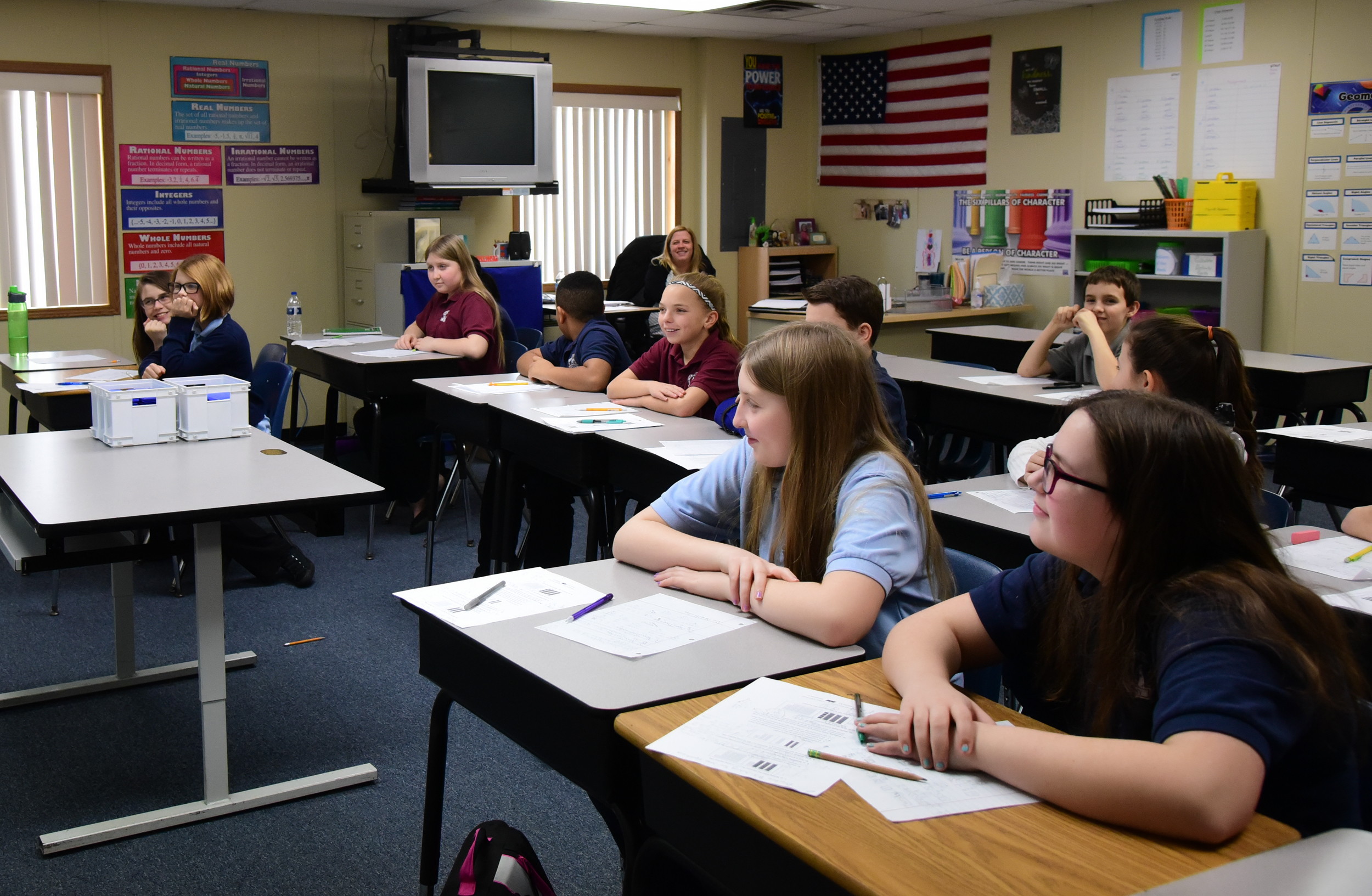 Merritt Academy middle school teacher in front of her class.